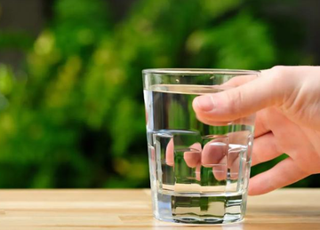 Does making saline solution require boiling the water?